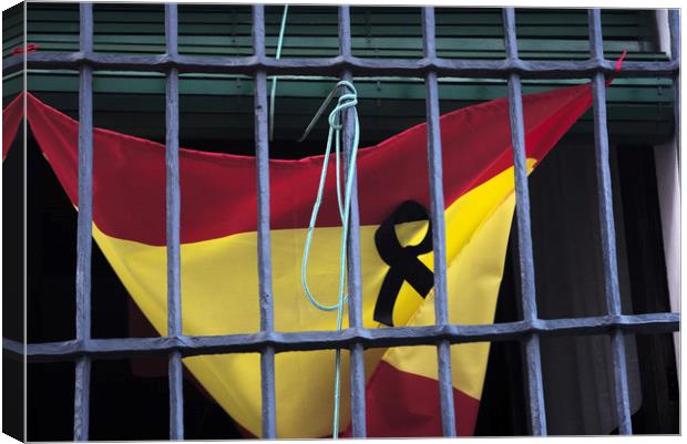 This is the Spanish flag with a black ribbon as a  Canvas Print by Jose Manuel Espigares Garc