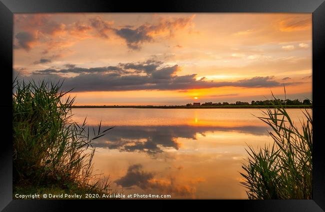 Sunset over Horsey Mere Framed Print by David Powley