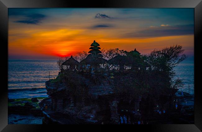 Sunset at Tanah Lot Temple, Bali. Framed Print by John Hudson