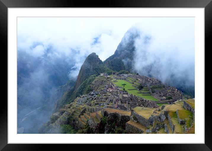 Machu Picchu in the mist Framed Mounted Print by Theo Spanellis