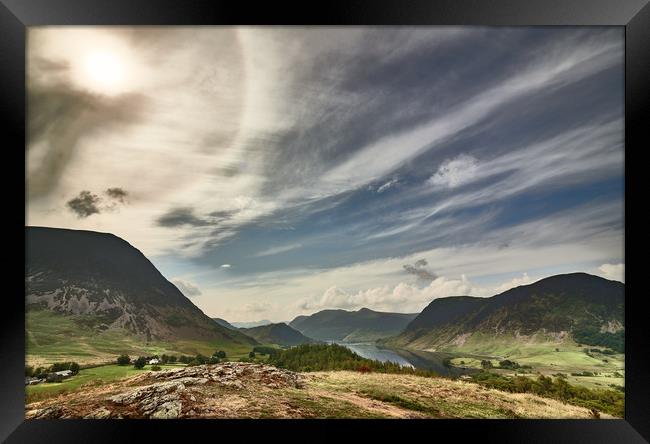 A Buttermere Sun Halo Framed Print by John Malley