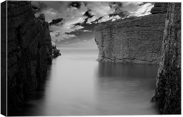 Sea and Rocks Canvas Print by Keith Thorburn EFIAP/b