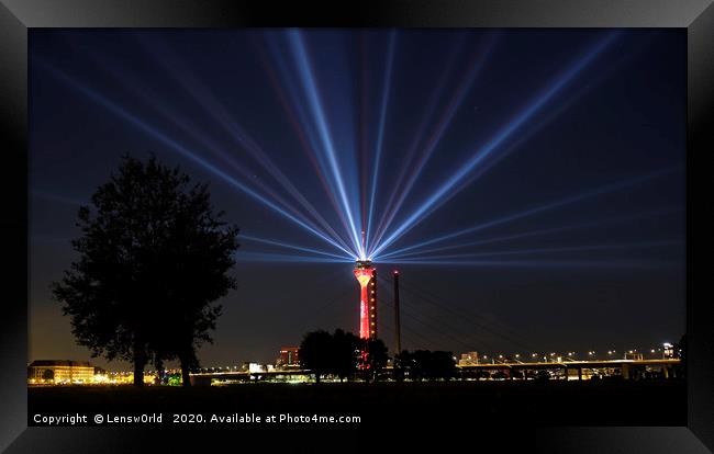 Light show from Düsseldorf's "Rheinturm" at night Framed Print by Lensw0rld 