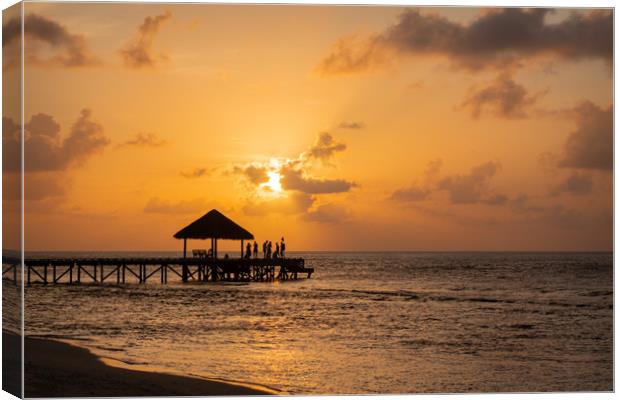 End of Pier Sunset Party, Maldives Canvas Print by Dave Collins