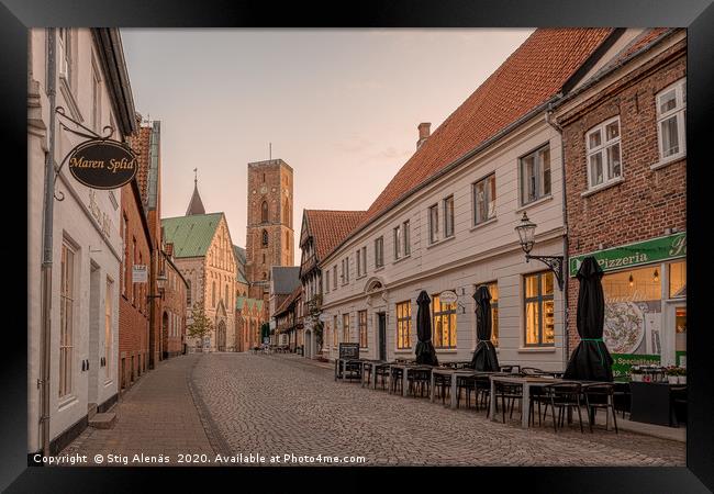 the tower of Ribe cathedral at the end of an old c Framed Print by Stig Alenäs