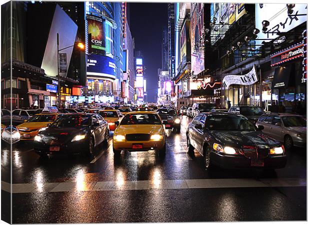 Yellow Cab and Times Square Canvas Print by peter tachauer