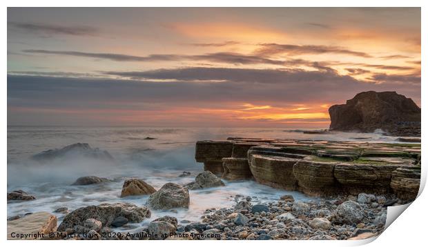 South Shields rocks at sunrise Print by Marcia Reay
