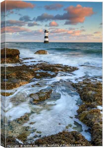 Incoming waves (Penmon Lighthouse) Canvas Print by Andrew Ray