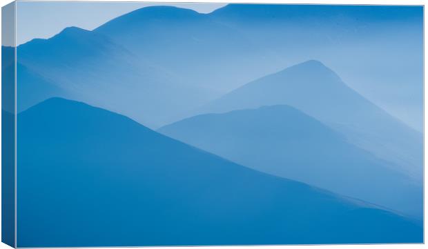 The Blue Ridged Mountains of the Lake District Canvas Print by John Malley