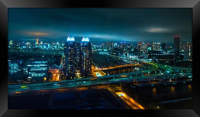 Aerial view over Tokyo by night - beautiful city l Framed Print by Erik Lattwein