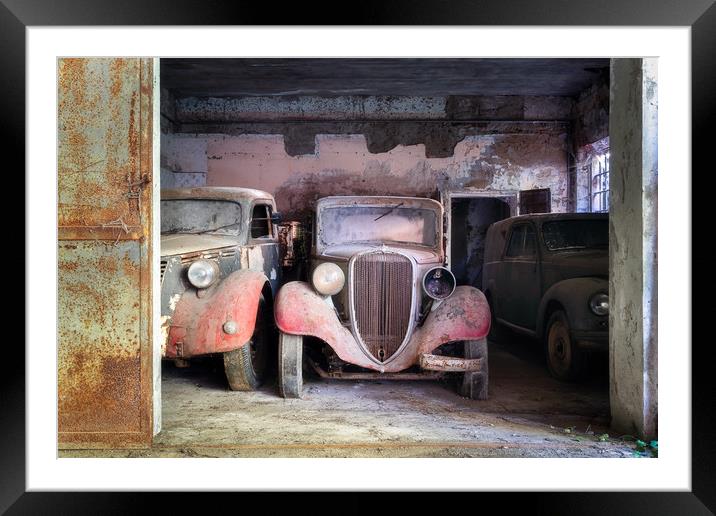 Abandoned Vintage Cars in Garage Framed Mounted Print by Roman Robroek