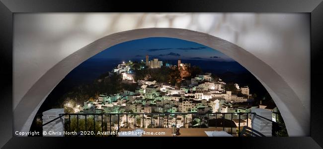Casares By Night Framed Print by Chris North