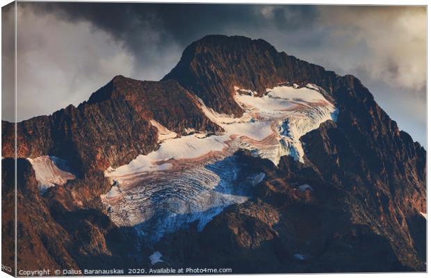 Sunset light shines on peak of mountain Roche de l Canvas Print by Dalius Baranauskas