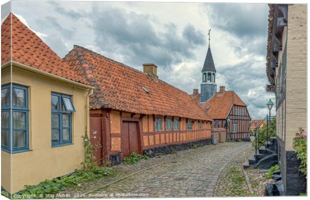 The old town of Ebeltoft with a  cobblestone-stree Canvas Print by Stig Alenäs