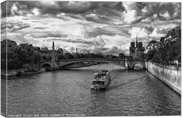 River Boat on the River Seine Canvas Print by Lynn Bolt
