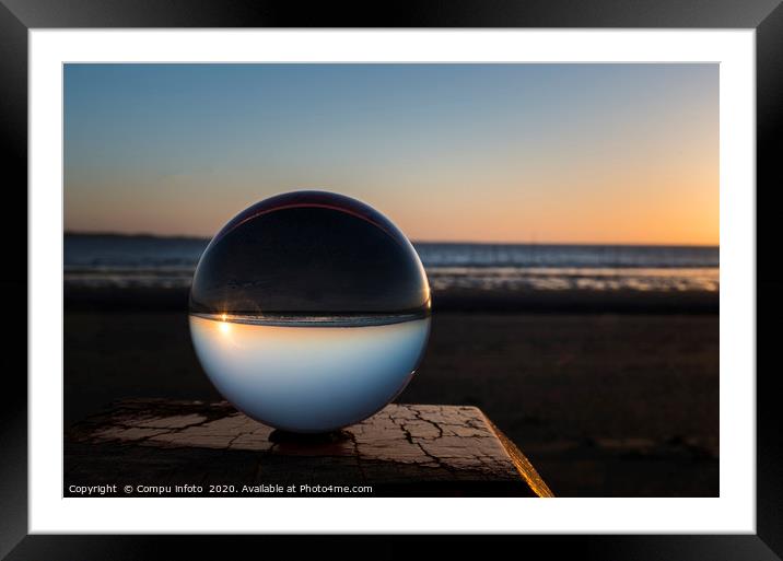 sunset on the beach captured in glass crystal sphe Framed Mounted Print by Chris Willemsen