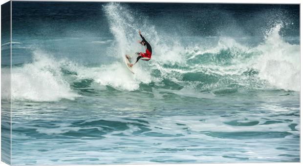 Action in the surf Canvas Print by Mick Blakey