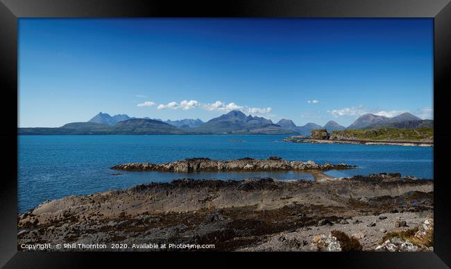 Sea and Mountains on the Isle of Skye Framed Print by Phill Thornton