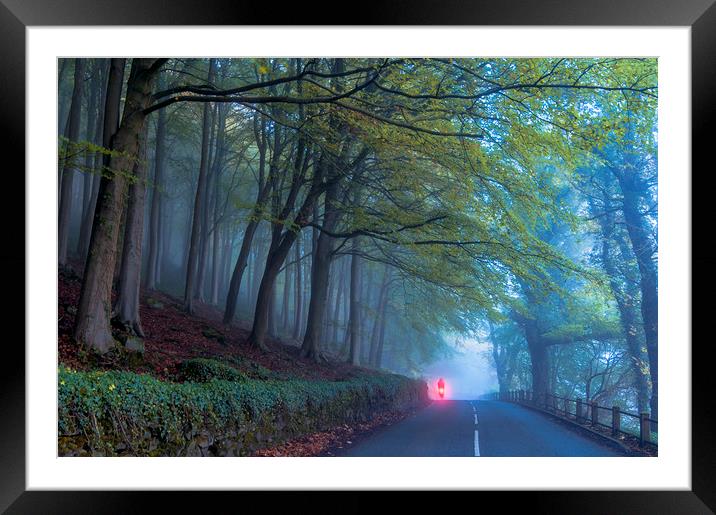 Rider in the mist, Peak District.  Framed Mounted Print by John Finney