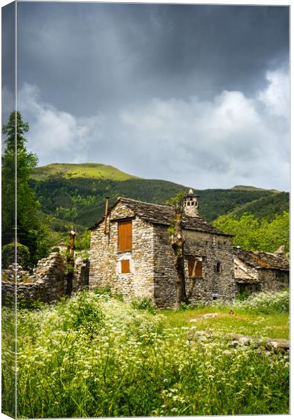 A rustic Spanish stone-walled cottage Canvas Print by Stephen Rennie