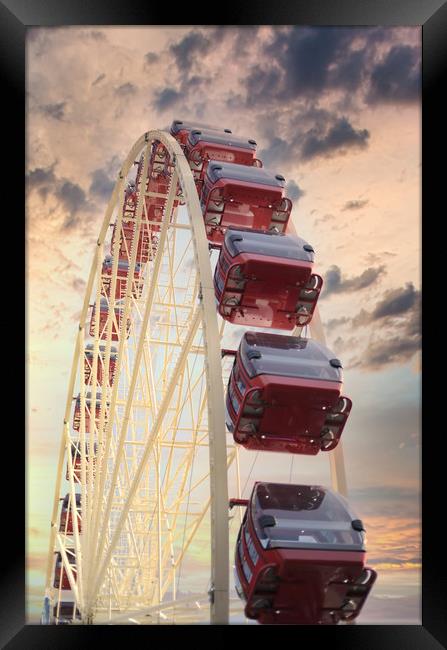Red panoramic wheel on sunset background Framed Print by federico stevanin