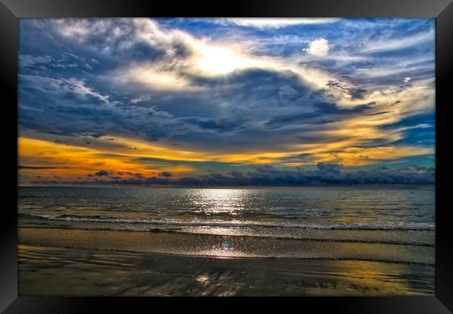 Borneo seascape at sunset Framed Print by Simon Marlow