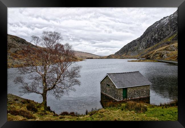 The cabin on the lake at Ogwen Framed Print by Simon Marlow
