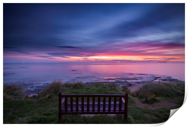 Bamburgh beach with a lone bench Print by John Finney