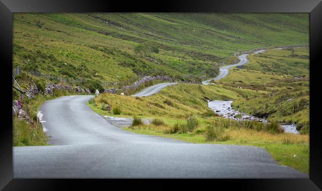Winding Welsh mountain road Framed Print by Leighton Collins