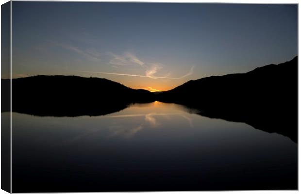 Sunrise over lake at Snowdon, Snowdonia Canvas Print by Christopher Stores