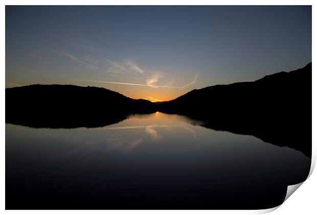 Sunrise over lake at Snowdon, Snowdonia Print by Christopher Stores