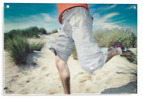 blurry photo of man legs running through sand Acrylic by federico stevanin