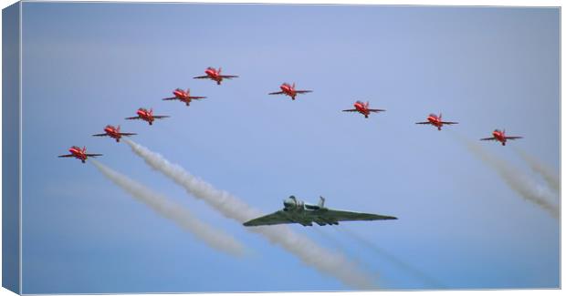 The Majestic Vulcan and Red Arrows in their Final  Canvas Print by Simon Marlow