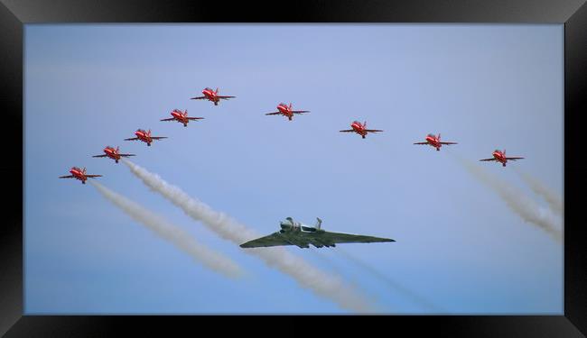 The Majestic Vulcan and Red Arrows in their Final  Framed Print by Simon Marlow