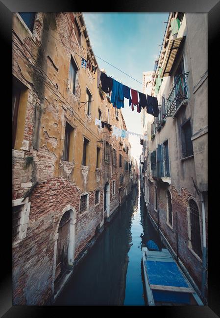 clothes hanging in the canal with gondolas, Venice Framed Print by federico stevanin