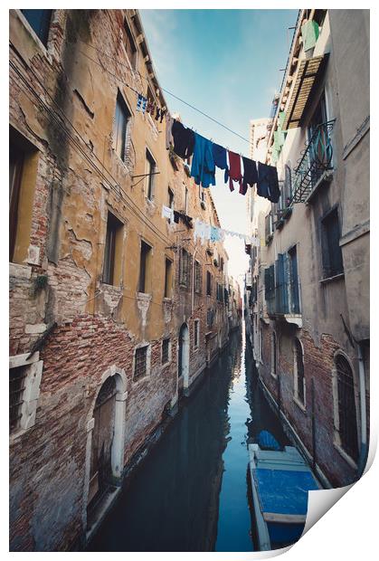 clothes hanging in the canal with gondolas, Venice Print by federico stevanin