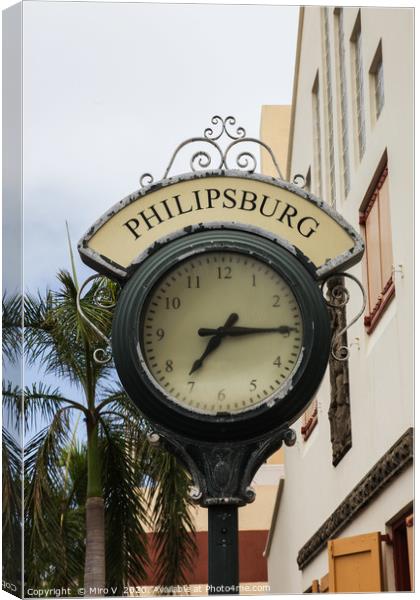 Clock from Shopping area on Back Street in Philips Canvas Print by Miro V
