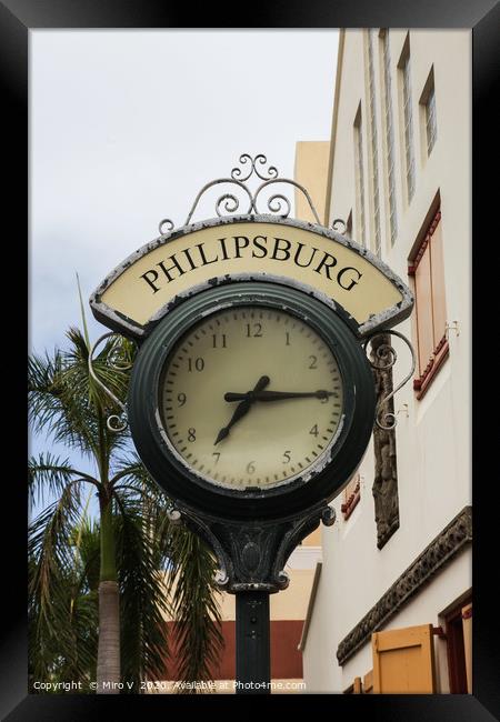 Clock from Shopping area on Back Street in Philips Framed Print by Miro V