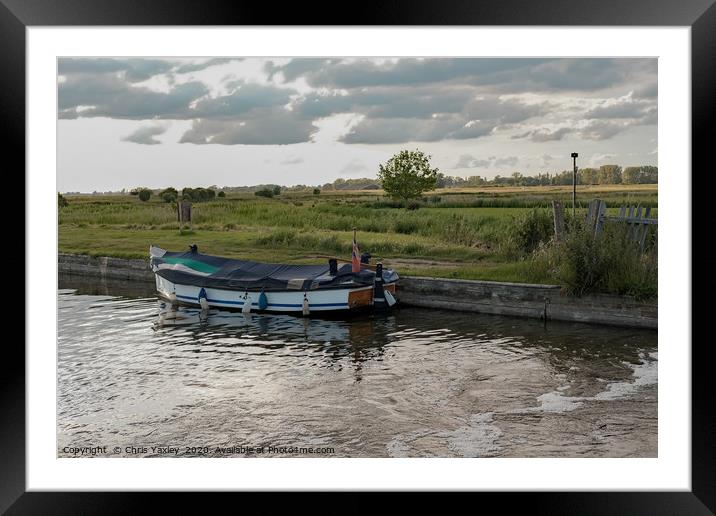 Moored on Thurne Dyke at dusk Framed Mounted Print by Chris Yaxley
