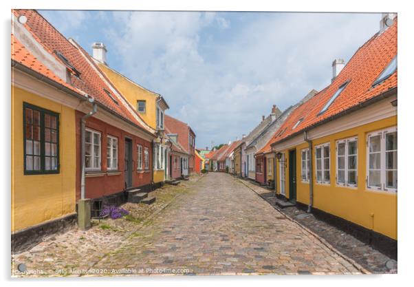 an idyllic street with cobblestone and old houses  Acrylic by Stig Alenäs