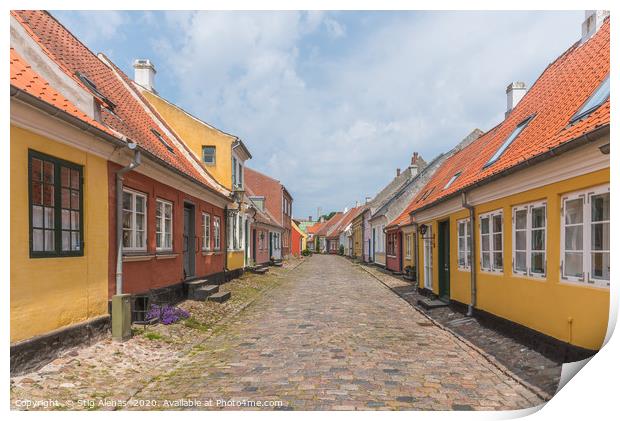 an idyllic street with cobblestone and old houses  Print by Stig Alenäs