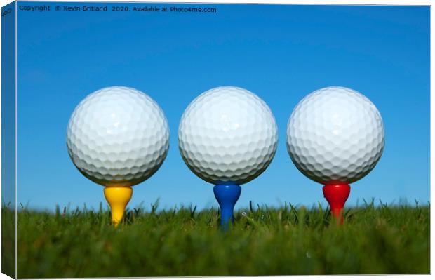 golf balls on tees Canvas Print by Kevin Britland