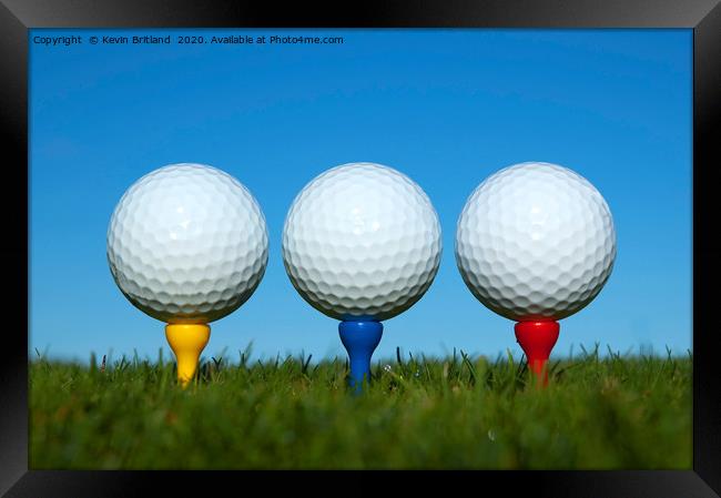 golf balls on tees Framed Print by Kevin Britland
