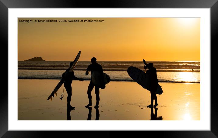 Surfers at sunset Framed Mounted Print by Kevin Britland