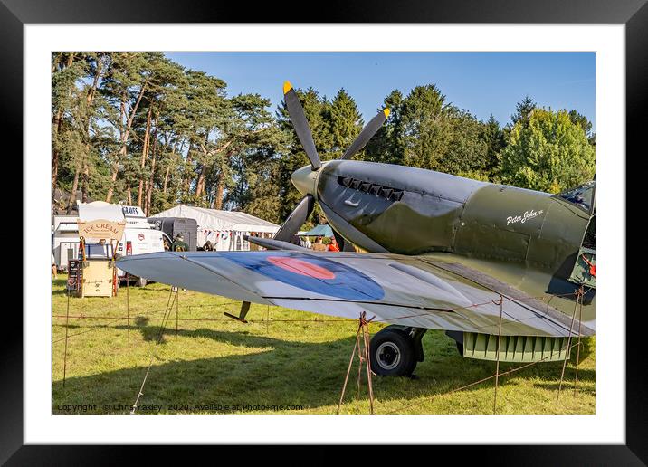 A vintage WW2 Spitfire plane on display  Framed Mounted Print by Chris Yaxley