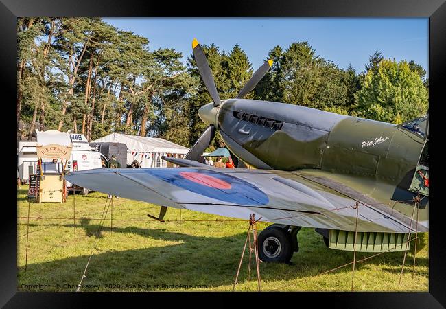 A vintage WW2 Spitfire plane on display  Framed Print by Chris Yaxley