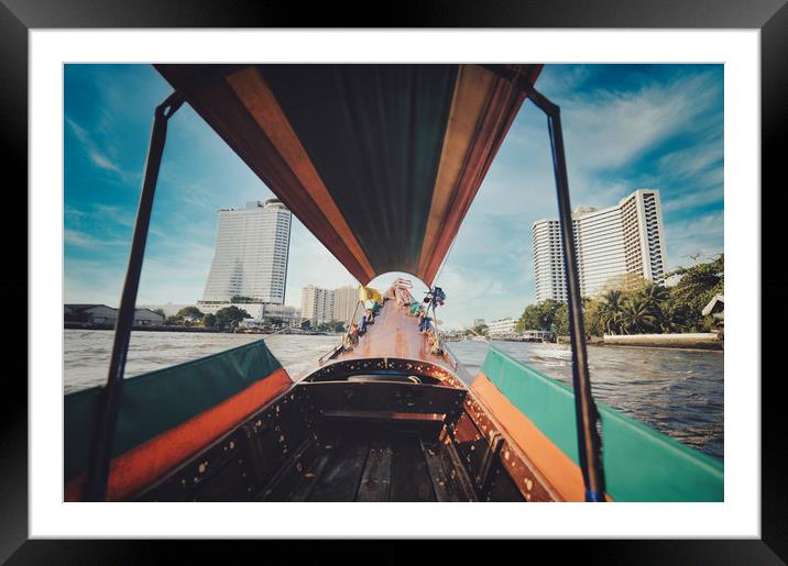 long tail boat on Chao Phraya river in Bangkok Framed Mounted Print by federico stevanin