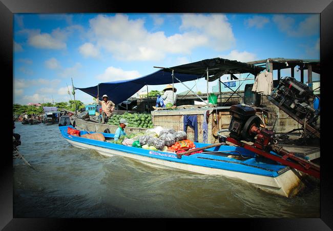 River boat on the Mekong Delta at Hoi An Framed Print by Simon Marlow