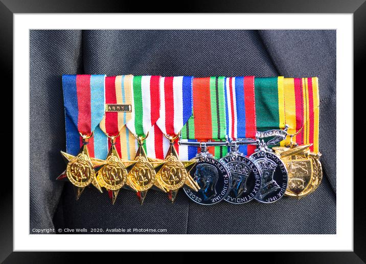 Proud row of medals Framed Mounted Print by Clive Wells