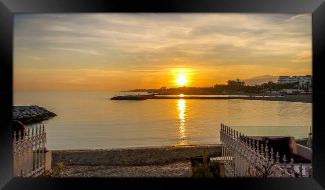 Puerto Banus beach at sunset Framed Print by Naylor's Photography